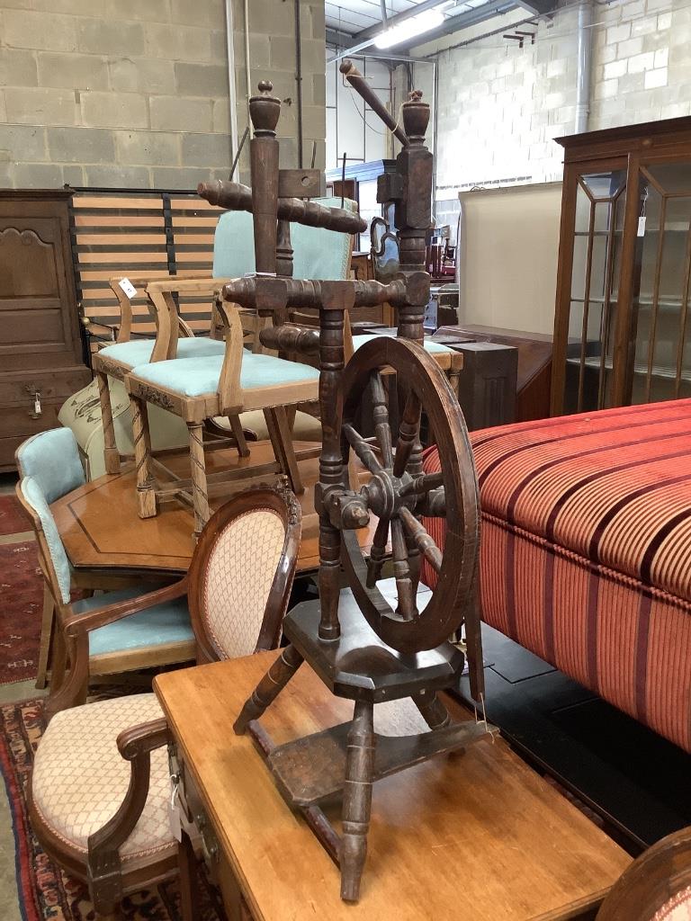 A provincial turned beech spinning wheel, height 100cm